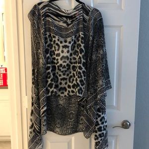 Either vest or cover up